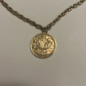 Vintage Sarah Coventry Capricorn zodiac gold tone necklace